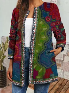 Detailed view of women's vintage ethnic print jacket with vibrant abstract patterns.