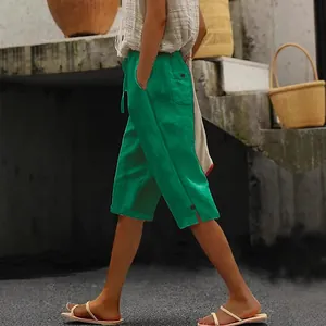 Pantalon court en coton et lin vert émeraude avec taille élastique à cordon et poches