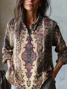 Detailed view of bohemian floral print and button design on this casual women's shirt