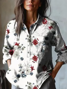 Detailed close-up of a stylish floral print long sleeve shirt with pocket and buttons.