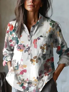 Detailed view of the casual floral print blouse with buttons and a front pocket design