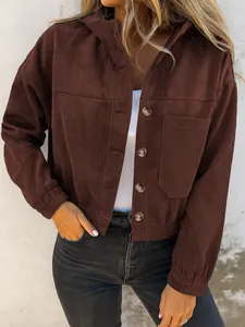 Detailed view of women's casual brown corduroy hooded jacket with pockets and buttons