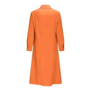 Orange long-sleeved shirt dress back view showing minimalist loose fall fashion design.