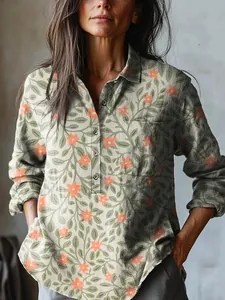 Macro view of women's casual long-sleeved shirt with vintage floral print and pocket