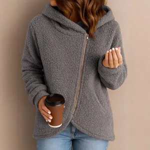 Women's loose gray sherpa fleece hoodie with fashionable side zipper and long sleeves.