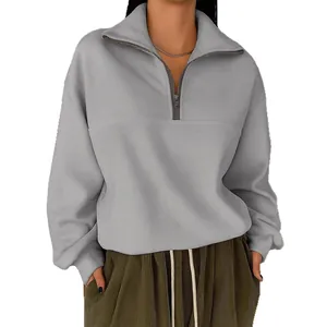 Felpa grigia larga da donna con mezza zip e colletto a rever per la moda autunno-inverno