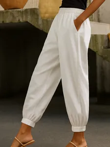 Pantaloni casual in cotone e lino bianchi da donna con vita elastica e due tasche