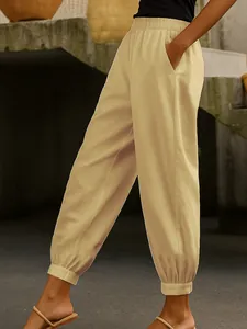 Pantaloni jogger in cotone e lino beige chiaro con vita elastica e tasche laterali casual