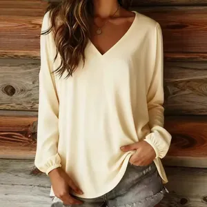 Elegant women's solid color V-neck long sleeve blouse in loose fit casual style.