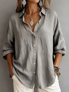 Women's casual relaxed grey button-down long sleeve shirt in premium textured fabric.