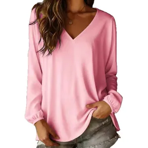 Elegant women's V-neck long sleeve pink blouse featuring a loose fit and soft fabric
