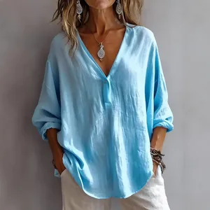 Stylish women's light blue V-neck loose linen blouse with long sleeves for fall