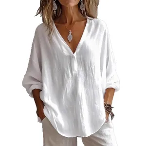 Casual loose white V-neck long sleeve blouse for women featuring a textured fabric design