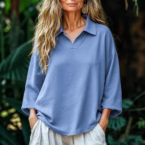 Casual loose-fit blue long-sleeve lapel shirt for women featuring a stylish V-neckline