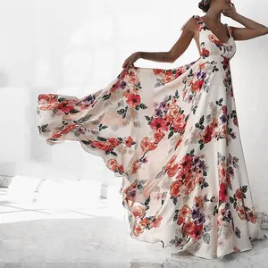 Flowy Bohemian floral print backless maxi dress with thin straps and large swing