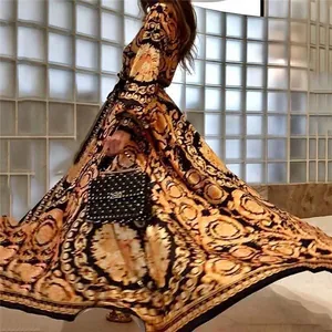 Vintage baroque print long-sleeve maxi dress with elegant flowing skirt detail
