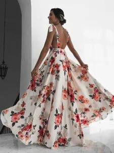 Back view of a bohemian floral maxi dress with elegant tie shoulder straps and open back