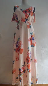 Elegant bohemian floral print maxi dress featuring a V-neck and cold shoulder sleeves