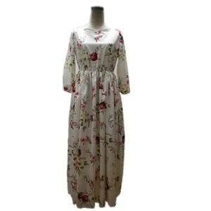 Bohemian floral print maxi dress with round neck and elegant three-quarter sleeves