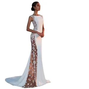 Elegante abito da sera bianco in pizzo con sexy trasparenze laterali e orlo lungo