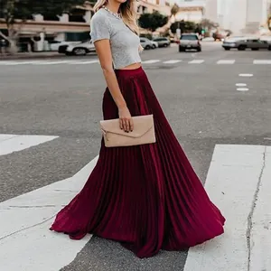Elegant wine red pleated maxi skirt featuring a high waist and a graceful flowing silhouette