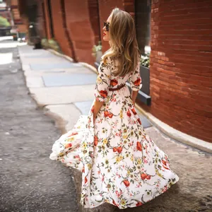 Elegant bohemian floral print maxi dress with 3/4 sleeves and matching brown belt