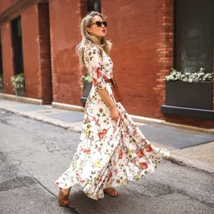 Bohemian floral print maxi dress featuring a crew neck and elegant 3/4 sleeves for women