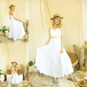 Elegant boho style white high-waisted maxi skirt with adjustable tie waist for beach vacation