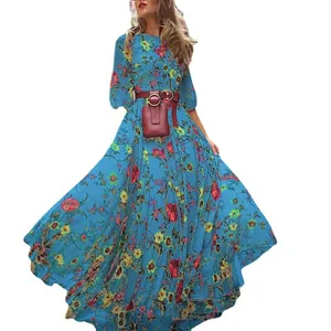 Bohemian floral print maxi dress with round neck, 3/4 sleeves and matching waist belt.