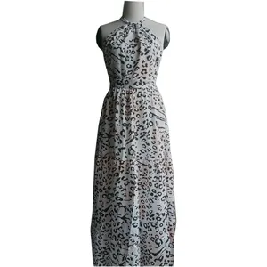 Sleeveless halter neck animal print maxi dress with high waist design on mannequin