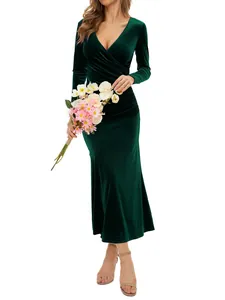 Close-up view of an elegant dark green velvet V-neck evening dress with mermaid hemline