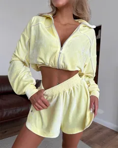 Sexy pale yellow velour tracksuit set with zip-up cropped hoodie and matching shorts