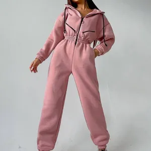 Detailansicht eines staubrosa Kapuzen-Fleece-Jumpsuits für Damen Sport und Freizeit