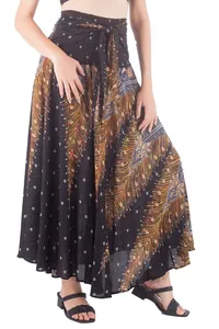 Bohemian printed maxi skirt with vibrant peacock feather patterns and adjustable tie waist.