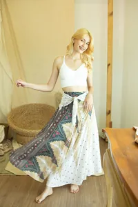 Macro detail of bohemian printed tie-waist maxi skirt for stylish summer beach wear