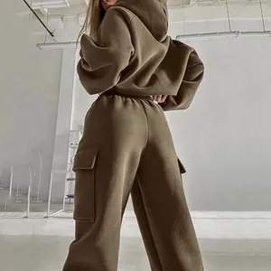 Detailed back view of a brown two-piece tracksuit featuring cargo pocket sweatpants.