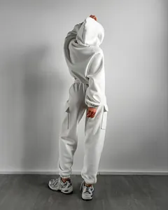 Back view of white hooded sweatshirt and cargo jogger pants set for women