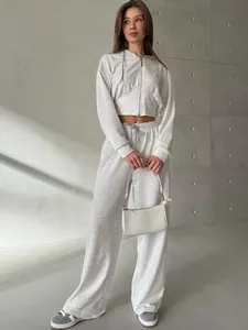 Women's two-piece casual set featuring a cropped zip hoodie and wide-leg drawstring pants.