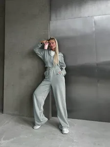 Stylish sage green two-piece tracksuit set for women with zip-up hoodie and wide-leg pants