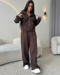 Stylish brown two-piece fleece tracksuit with hooded zip-up and wide-leg pants