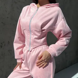 Set sportivo due pezzi rosa da donna con felpa con cappuccio a corsetto e pantaloni.