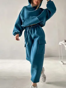 Stylish teal oversized fleece hoodie and matching cargo jogger pants for cozy autumn wear