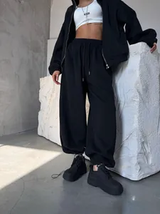 Ensemble deux pièces noir décontracté avec sweat à capuche zippé et pantalon large