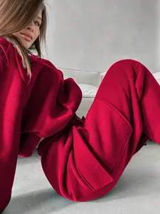 Stylish red fleece hoodie and cargo jogger set for women, cozy autumn winter sportswear