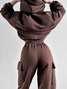 Detailed back view of a trendy women's brown hoodie and cargo joggers outfit set