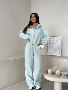 Stylish mint green 2-piece tracksuit set with hooded zip jacket and drawstring pants