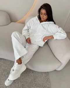 Women's two-piece gray cotton tracksuit set with zip-up hoodie and matching pants