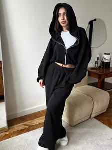 Casual black two-piece tracksuit with zip-up hoodie and wide-leg joggers for women