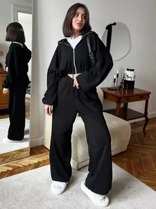 Two-piece black hooded tracksuit set featuring a zip-up hoodie and elastic waist pants