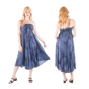 Front and back view of a blue printed strapless maxi beach dress on a model.